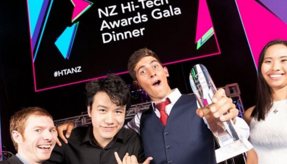photos of 4 people at NZ Hi-Tech Awards holding trophy